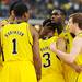 Michigan junior Tim Hardaway Jr. hugs sophomore Trey Burke during a huddle in the second half at Cowboys Stadium on Sunday, March 31, 2013. Melanie Maxwell I AnnArbor.com